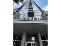 View of Viewpoint building's front entrance featuring modern architecture and prominent signage at 855 Peachtree Ne St # 2913, Atlanta, GA 30308