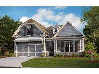 Charming craftsman-style home with gray siding, well-manicured lawn, and attached two-car garage at 64 Colonial Ter, Villa Rica, GA 30180