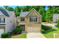 Charming two-story home with well-maintained lawn and inviting curb appeal at 315 Lakeside Ln, Woodstock, GA 30188