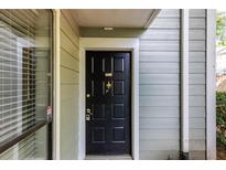Black front door with gold hardware and unit number 603 at 603 Summit North Ne Dr # 603, Atlanta, GA 30324