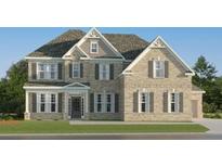 Traditional brick home with manicured lawn and welcoming front door, inviting curb appeal at 252 Deer Valley Run, Canton, GA 30115