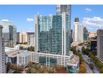 Modern high-rise building with stunning city views and architectural details on a sunny day at 3324 Peachtree Ne Rd # 1813, Atlanta, GA 30305