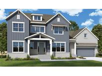 Charming two-story home features a welcoming front porch, attached two car garage, and beautiful modern design at 448 Lower Shoreline Sw Ct, Marietta, GA 30064