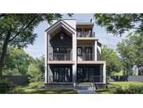 Stunning three-story home featuring a modern design, multiple balconies, and professional landscaping at 339 Peachtree Ne Ave, Atlanta, GA 30305
