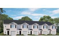 Charming townhomes with black shutters, grey siding, and a well-maintained lawn at 2804 Georgia Aster Way Nw, Atlanta, GA 30318