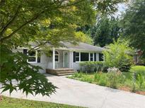 Charming single-story home with a well-maintained yard and a welcoming front porch at 2205 Desmond Dr, Decatur, GA 30033
