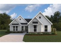 Charming single-Gathering home featuring board and batten siding, stone accents, and a well-manicured lawn at 15 Dartmoor Cir, Dallas, GA 30157