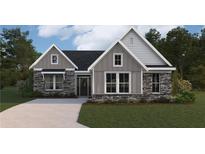 Charming single-story home featuring stone accents, board and batten siding, and a welcoming front porch at 46 Parkdale Ct, Dallas, GA 30157