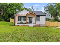 Charming renovated bungalow with new roof, fresh paint and inviting porch at 528 Allendale Dr, Decatur, GA 30032