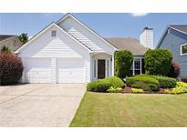 Charming one-story home with a well-manicured lawn and a two-car garage at 4527 Baker Grove Nw Rd, Acworth, GA 30101