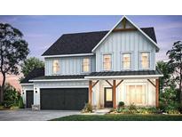 Charming two-story home with a three-car garage, covered entry and appealing farmhouse style exterior at 288 Rockledge Sw Bnd, Powder Springs, GA 30127