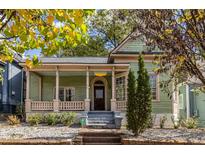 Charming home with a covered front porch and beautiful landscaping, offering a warm and inviting curb appeal at 360 Kelly Se St, Atlanta, GA 30312