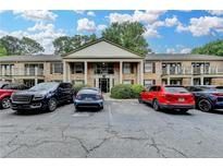 Beautiful brick apartment building with classic columns and convenient parking at 3650 Ashford Dunwoody Rd, Ne, #923 # 923, Atlanta, GA 30319