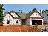 New construction featuring a gabled roof, black trimmed windows, and a spacious two car garage at 490 Charleston Pl, Villa Rica, GA 30180