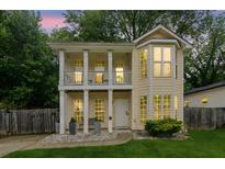 Charming two-story home featuring a welcoming front porch and balcony at 1001 Dunning Se St, Atlanta, GA 30315
