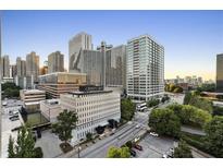 A stunning high-angle view of the building with city skyline views at 215 Piedmont Ne Ave # 1001, Atlanta, GA 30308