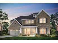 Charming two-story brick home featuring a manicured lawn, covered porch, and attached two-car garage at 5430 Hyde Rd, Cumming, GA 30040