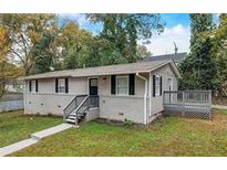 Charming home with updated siding, new deck and front yard at 1101 White Oak Ave, Atlanta, GA 30310