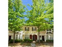 Charming townhome with well-maintained front yard and inviting entrance at 1794 Fielding Way, Hampton, GA 30228