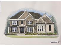 Charming two-story home featuring a symmetrical facade, gabled roof, and welcoming entrance at 177 West Lake Blvd, Carrollton, GA 30116