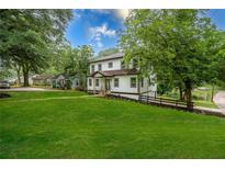 Charming two-story home featuring a well-manicured lawn and inviting curb appeal at 754 Fayetteville Se Rd, Atlanta, GA 30316