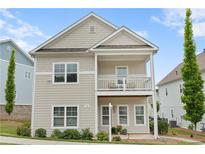 Charming two-story home with a welcoming front porch and second story balcony at 230 Fender Walk, Marietta, GA 30060