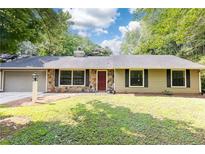 Charming single-story home with stone accents, neutral siding, and a well-maintained front yard at 2753 Fireside Se Ct, Marietta, GA 30067