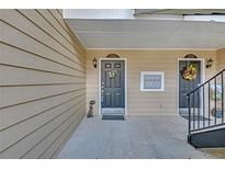 Inviting front entrances to units 1705 and 1706 offer welcoming decor and convenient mailbox access at 1705 Brighton Pt, Atlanta, GA 30328