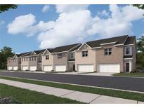 Newly constructed townhomes feature brick exteriors, two-car garages, and professionally landscaped surroundings at 1221 Fagiolo St, Mcdonough, GA 30253