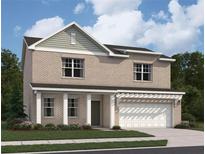 Charming two-story brick home with covered porch and attached garage at 436 Corricella Ct, Mcdonough, GA 30253