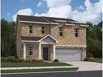 Charming two-story brick home with attached garage and well-maintained landscaping at 412 Corricella Ct, Mcdonough, GA 30253