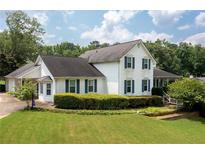Charming two-story home with landscaped front yard and classic white siding at 2692 Wellington Dr, Marietta, GA 30062