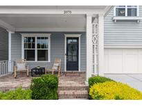 Comfortable front porch with seating, offering a relaxing outdoor space at 2075 Parkhaven Ct, Roswell, GA 30076
