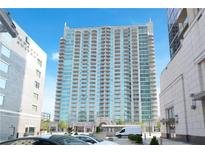 Luxury high-rise condo building featuring modern architecture and private balconies in a vibrant city location at 361 17Th Nw St # 1702, Atlanta, GA 30363