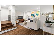 Inviting living room features hardwood floors, stylish decor, and comfortable seating, creating a perfect relaxation space at 802 Frederica Ne St # 5, Atlanta, GA 30306