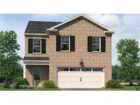 Charming two-story brick home with black shutters, a two-car garage, and a well-maintained front yard at 6112 Knickerbocker St, Mableton, GA 30126
