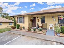Inviting porch with colorful flowers and charming decor enhancing the curb appeal of the home at 1101 New Horizon St, Powder Springs, GA 30127
