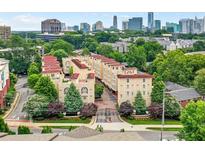 Beautiful exterior view showcasing well-maintained landscaping and architectural details of this home near the Atlanta skyline at 3541 Roswell Ne Rd # 21, Atlanta, GA 30305
