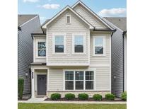 Charming two-story home featuring a cozy front porch and well-maintained landscaping at 791 Belrose Dr, Smyrna, GA 30080