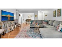 Inviting living room featuring hardwood floors, comfortable seating, and a modern entertainment center at 5145 Roswell Road # 3, Atlanta, GA 30342