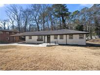 Charming brick home with updated landscaping and modern black trim at 2277 Cloverdale Se Dr, Atlanta, GA 30316