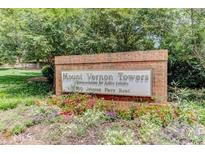 Mount Vernon Towers community sign for active seniors with colorful flowers in front at 300 Johnson Ferry Ne Rd # B604, Atlanta, GA 30328
