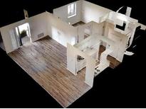 A 3D rendering showcases an apartment's layout, highlighting wood flooring, a kitchen with white cabinets, and natural light at 300 Johnson Ferry Ne Rd # B604, Atlanta, GA 30328