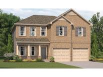 Charming two-story brick home with a two-car garage and well-manicured lawn at 1204 Arnhem Dr, Hampton, GA 30228