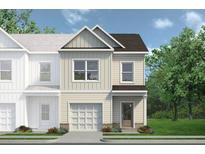 Charming townhome featuring a one-car garage and a welcoming front entrance with sidewalk appeal at 55 Alameda St # 6, Loganville, GA 30052