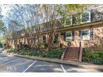 Charming brick townhomes featuring well-manicured landscaping and convenient parking at 1261 Lavista Ne Rd # M-4, Atlanta, GA 30324