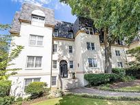 Charming, multi-story building with manicured lawn and mature trees in a desirable community at 1230 Piedmont Ne Ave # 405, Atlanta, GA 30309