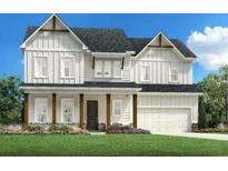 Charming two-story home featuring a welcoming front porch, white siding, and a well-manicured lawn at 4710 Crestline View Rd, Cumming, GA 30028