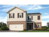 Two-story home featuring brick and vinyl siding with a two-car garage at 8225 Coldstream Dr, Fairburn, GA 30213