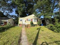 Charming one-story home with sidewalk and steps leading to a welcoming front entrance at 1106 Donnelly Sw Ave, Atlanta, GA 30310
